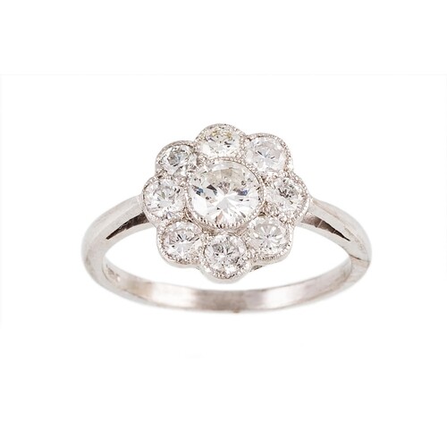 A DIAMOND 'DAISY' CLUSTER RING, the brilliant cut diamonds m...