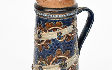 A Doulton Lambeth stoneware jug probably by George Tinworth