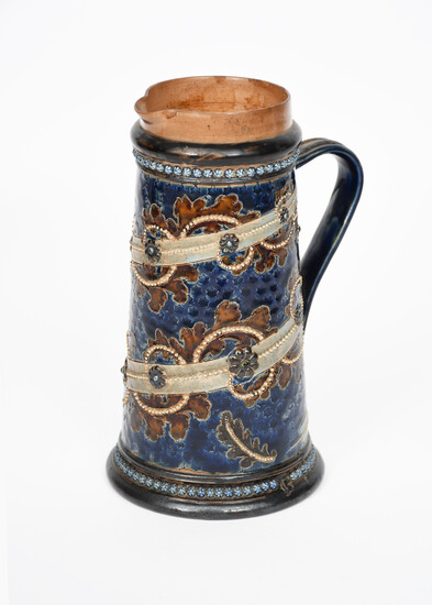 A Doulton Lambeth stoneware jug probably by George Tinworth