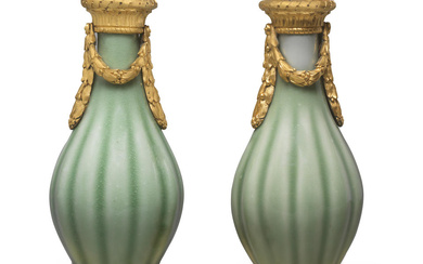 A FINE AND RARE PAIR OF CELADON-GLAZED ORMOLU-MOUNTED VASES The...