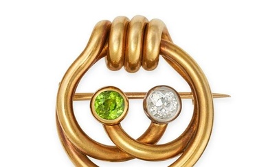 A FINE ANTIQUE DIAMOND AND DEMANTOID GARNET KNOT BROOCH, POSSIBLY RUSSIAN in 18ct yellow gold, se...
