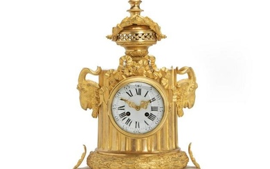 A French White Marble And Gilt Bronze Clock