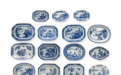 A GROUP OF FIFTEEN CHINESE BLUE AND WHITE SERVING DISHES QIN...