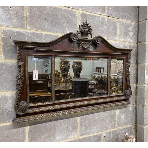 A George II style parcel gilt mahogany overmantel mirror, wi...
