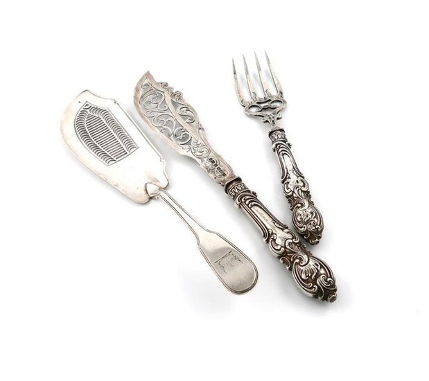 A George III silver Fiddle and Thread pattern fish slice, by Eley, Fearn and Chawner, London 1809, the blade with pierced decoration, the terminal with a crest, plus a pair of Victorian silver fish servers, by Roberts & Slater, Sheffield 1855, approx...