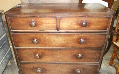 A Georgian mahogany chest of two short and three long cockbe...