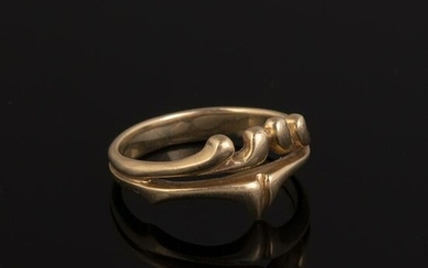 A Gold Wave Form Ring