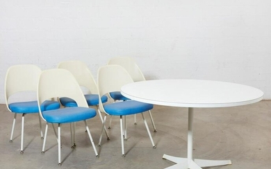 A Knoll circular dining table and five chairs
