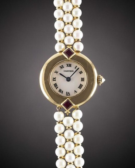 A LADIES 18K SOLID GOLD & PEARL CARTIER COLISEE