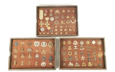 A LARGE COLLECTION OF MILITARY MEDALS AND HAT BADGES...