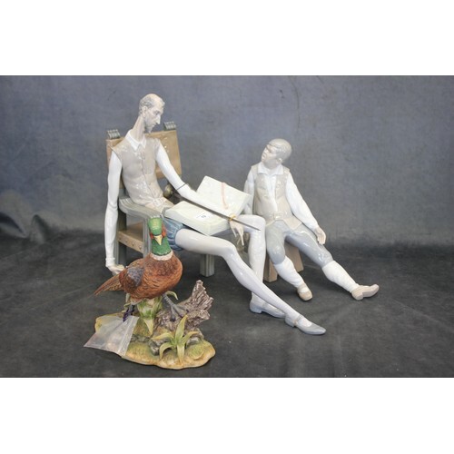 A Lladro figure of Don Quixote seated in chair, 37cm high a....