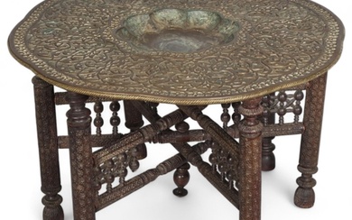 A Middle Eastern bras tray-top table, late 19th/early 20th c...