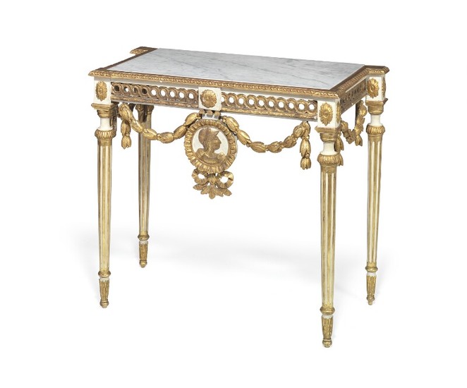 A North Italian Louis XVI style giltwood and white painted console. 19th century. H. 92 cm. W. 108 cm. D. 53 cm.