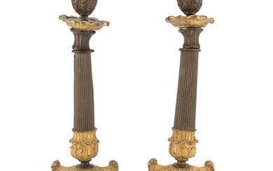 A PAIR OF CANDLESTICKS IN BURNISHED AND GILDED BRONZE - EMPIRE PERIOD