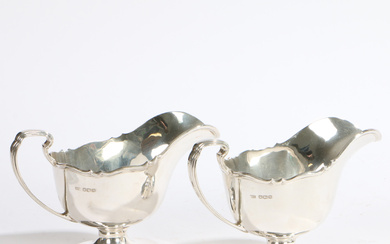 A PAIR OF GEORGE V SILVER SAUCEBOATS.