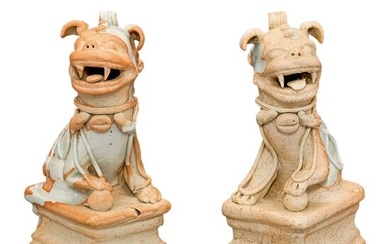 A PAIR OF QINGBAI FIGURES OF BUDDHIST LIONS YUAN DYNASTY | 元 青白釉坐獅一對
