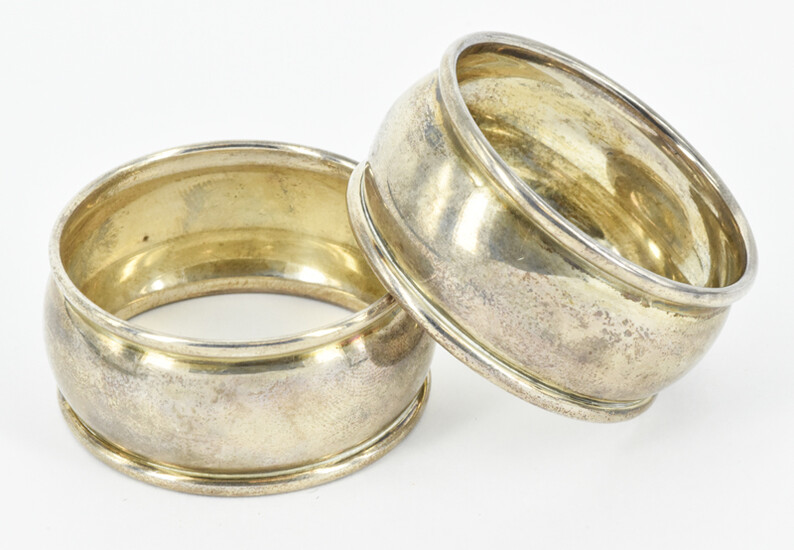 A PAIR OF STERLING SILVER NAPKIN RINGS