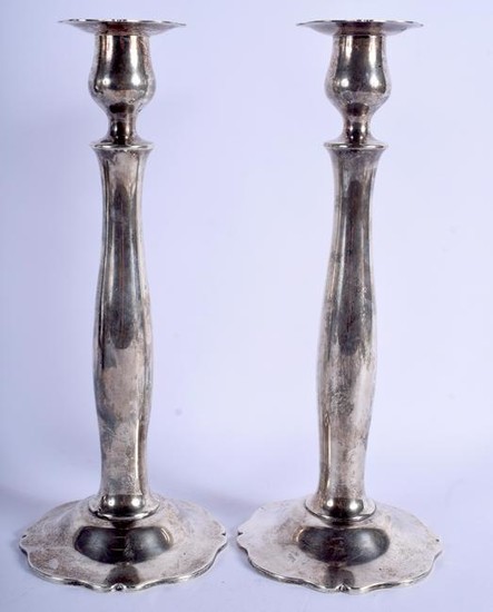A PAIR OF VINTAGE STERLING SILVER CANDLESTICKS. 15 oz.