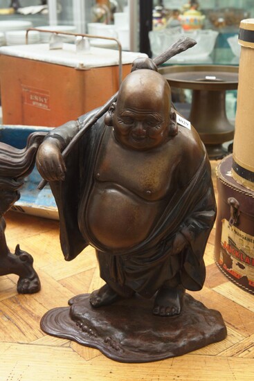 A PATINATED IRON BUDDHA FIGURE WITH STICK ACROSS SHOULDER, H.44CM, LEONARD JOEL LOCAL DELIVERY SIZE: SMALL