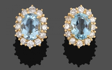 A Pair of 18 Carat Gold Aquamarine and Diamond Cluster...