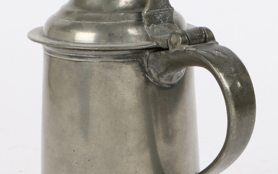 A Queen Anne pewter OEWS quart high domed-lidded tankard, circa 1710 The straight-sided tapering