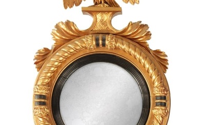 A REGENCY GILT CARVED WOOD CONVEX HANGING MIRROR