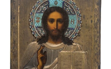 A Russian icon showing Christ Pantokrator with silver-gilt oklad and cloisonné-enamelled halo, late