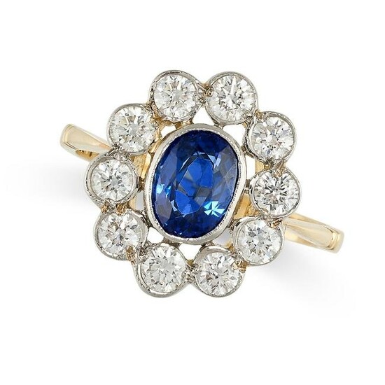 A SAPPHIRE AND DIAMOND OPEN WORK CLUSTER RING