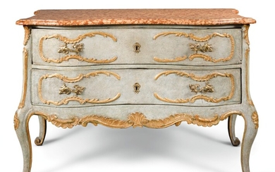 A SOUTH GERMAN CARVED, PARCEL-GILT AND PAINTED COMMODE