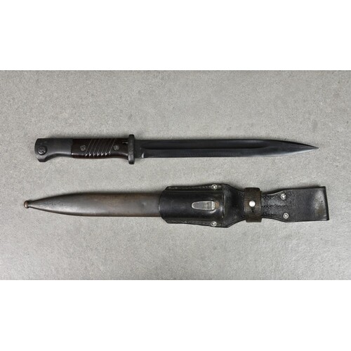 A Second World War German K98 bayonet with scabbard and frog...