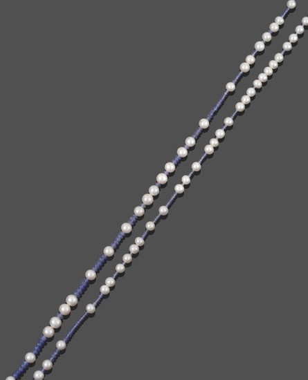 A Tanzanite and Cultured Pearl Necklace, smooth tanzanite beads spaced...