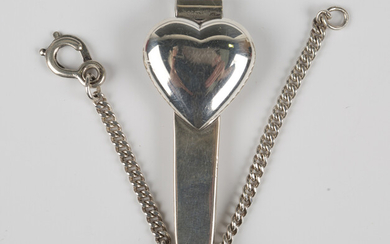 A Tiffany & Co silver tie slide with a heart shaped motif, detailed 'Tiffany & Co maker