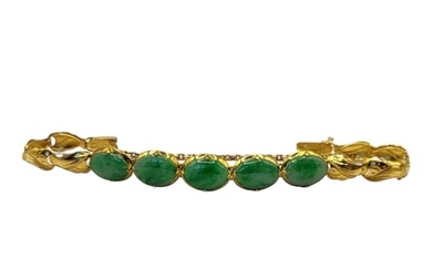 A VINTAGE CHINESE YELLOW METAL AND JADE BRACELET Five caboch...