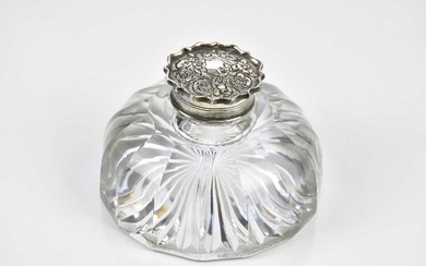A Victorian hallmarked silver topped and cut glass inkwell, London...