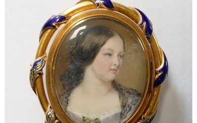 A Victorian oval portrait miniature of a young woman, housed...