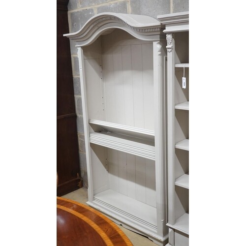 A Victorian style painted domed top open bookcase, width 116...