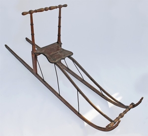 A WOODEN SLEDGE