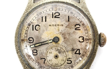 A WWII era Moeris military issue ATP wristwatch, numbered P5803 under broad arrow mark