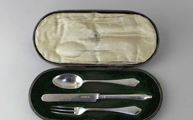 A cased George V silver three piece Christening set