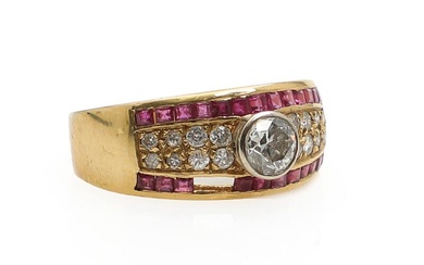 A diamond-and ruby ring set with old-cut diamond flanked by brilliant-cut diamonds...