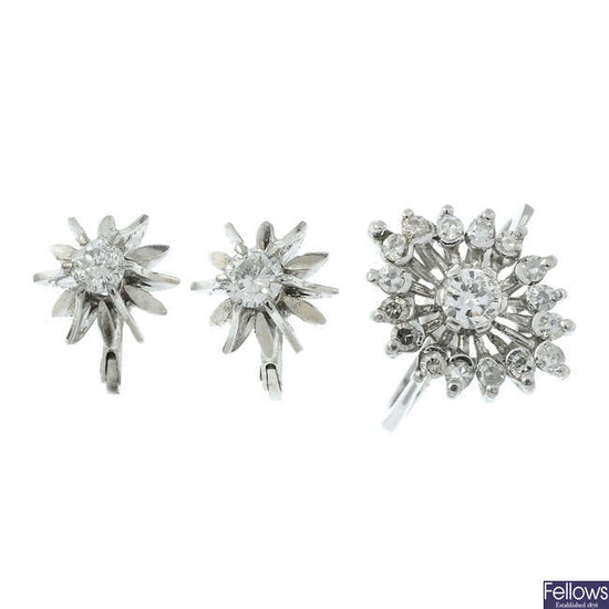 A diamond dress ring and a pair of diamond earrings.