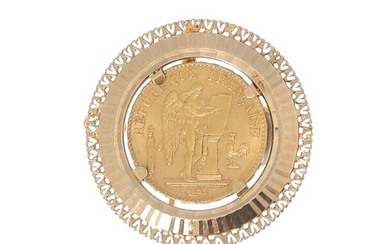 A gold piece of 20 FF Génie 1878 mounted as a brooch and pendant on 18 K (750 °/°°) yellow gold Gross