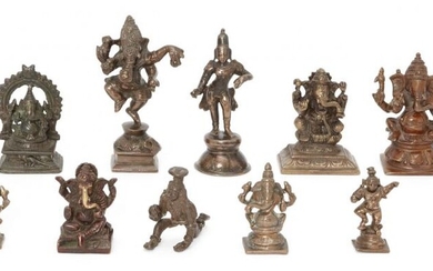 A group of brass and bronze figures,...