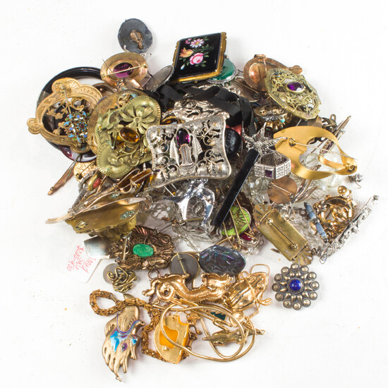 A group of costume and metal jewelry