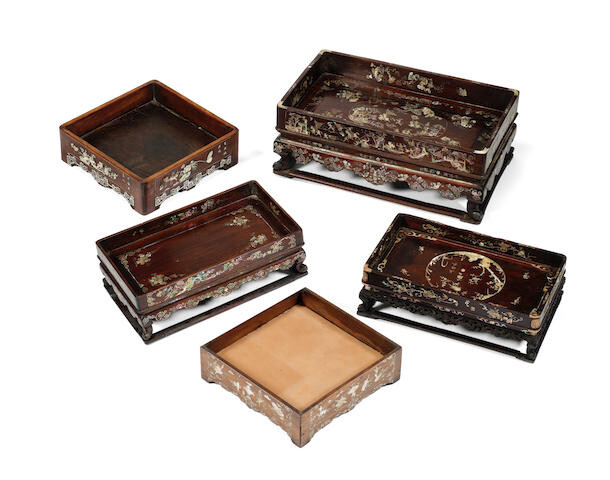 A group of mother-of-pearl inlaid hongmu stands