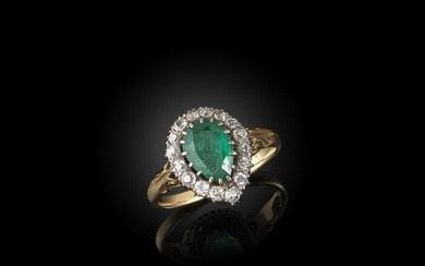 A late 19th century emerald and diamond cluster...