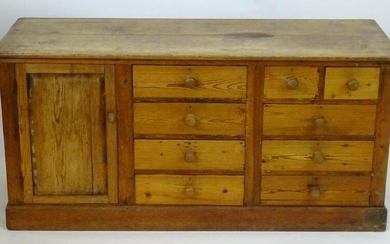 A late 19thC pine dresser base with a moulded