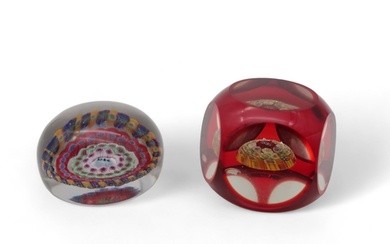 A millefiori paperweight dated 1854, possibly Baccarat, toge...