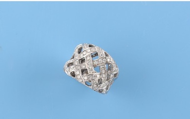 A modern 18ct white gold diamond lattice work ring, the esti...