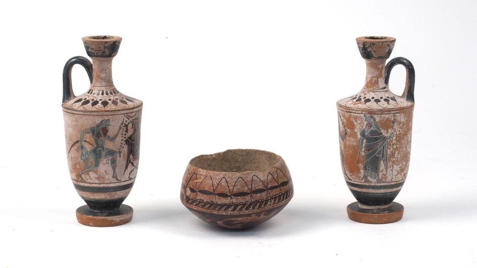 A modern Greek style terracotta bowl, hand-painted in slip depicting a figure playing an instrument, 10cm diameter, together with two lekythos, of the same style, each showing different scenes, each 15.8cm high (3)